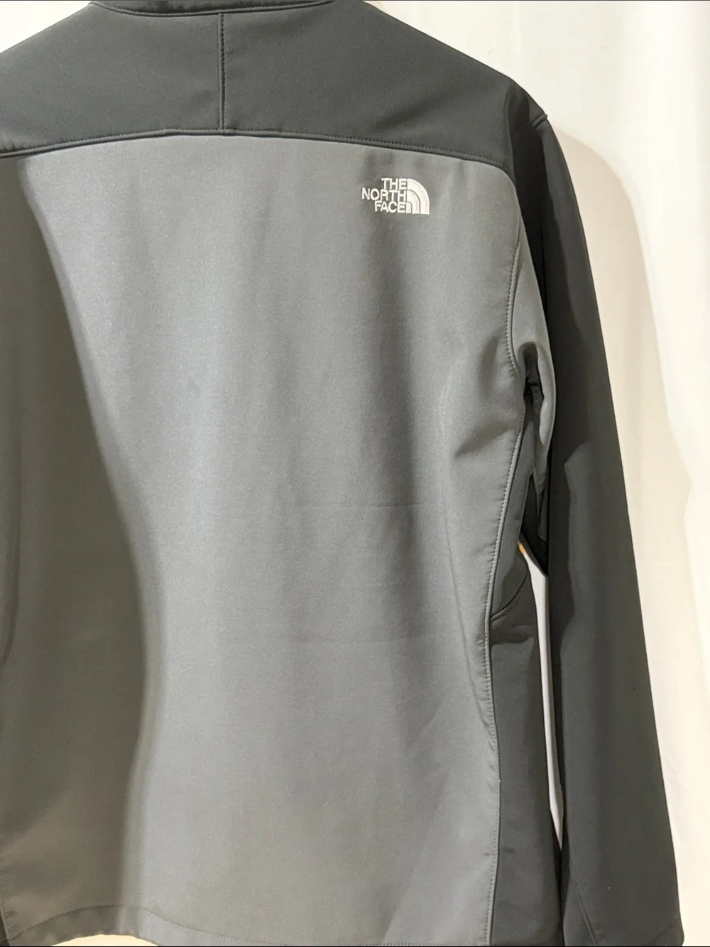North Face Men's Gray and Black Softshell Jacket with Yellow Accents